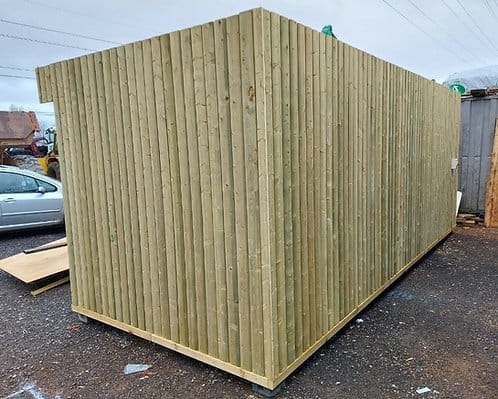 37e3c5_beabad914a8f4da3a8d5499bbffcb528mv2.jpg Module Container Aménagé – avec bardage en bois massif (14 m2)